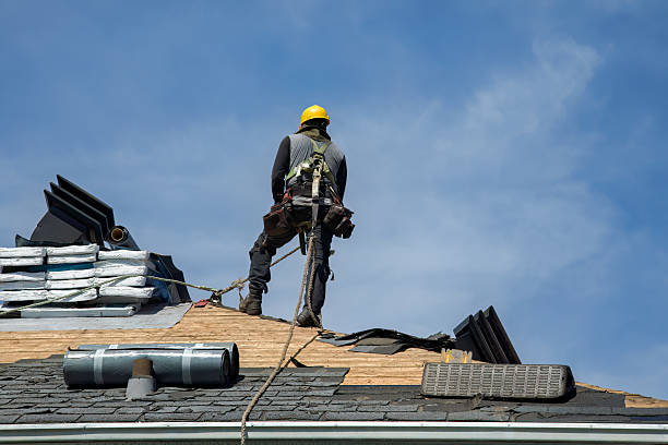 Professional Roofing technician working in De Borgia, MT